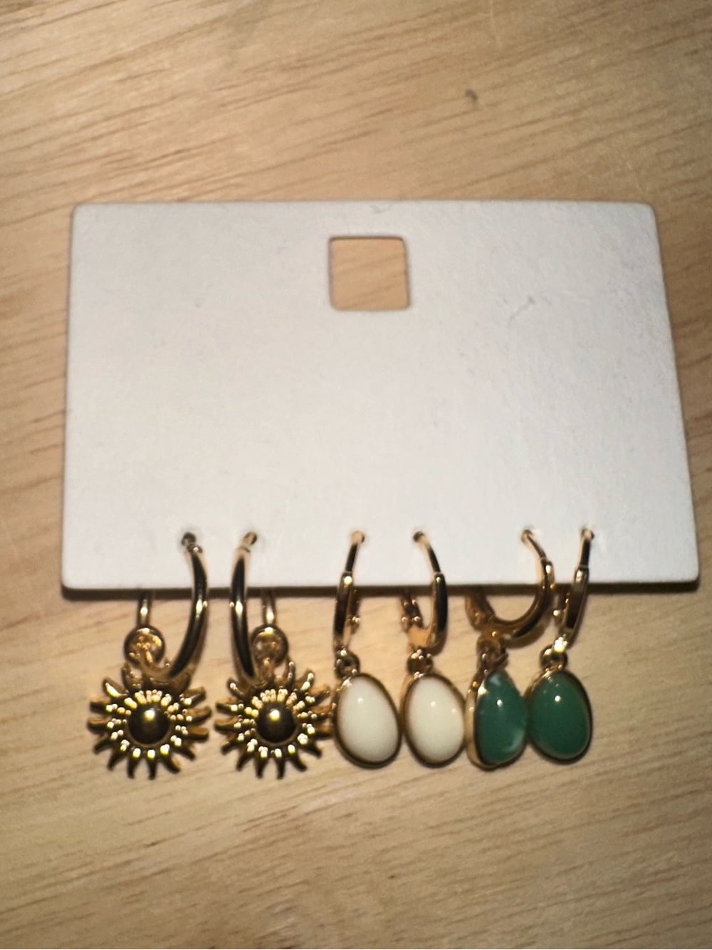 Set of 3 gold huggie earrings